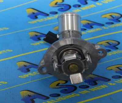 THERMOSTAT AND HOUSING ADAM 1000CC 3CYL